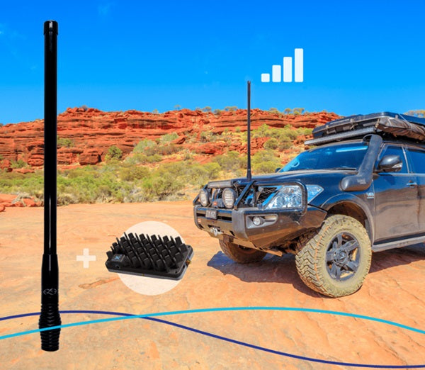 Car standing in front of a hilly terrain with Zetifi smart antenna and Cel-Fi booster installed