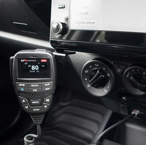 UHF Handpiece Mounted on A Microphone Bracket inside a Car