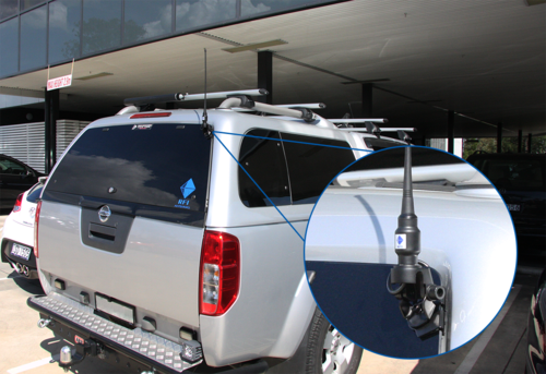 right side view of a car an antenna installed with RFI boot mount