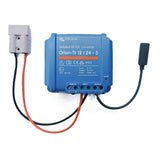 Blue DC/DC converter with cables on a white background