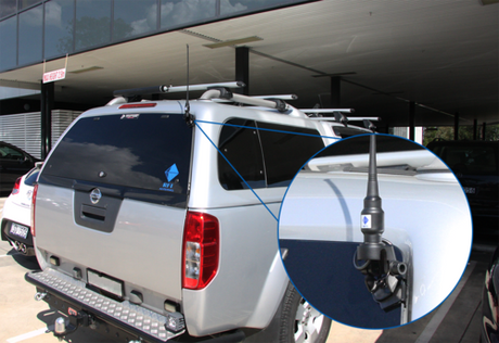 right side view of a car an antenna installed with RFI boot mount